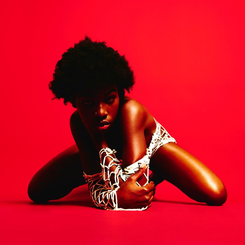 Lucia Bindang in Red by Kenneth Svendlund