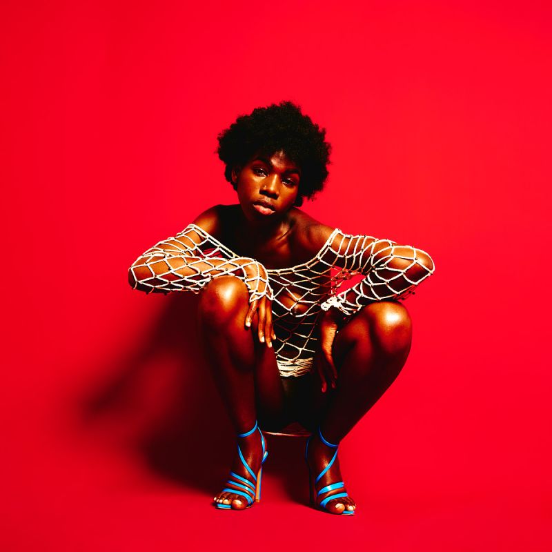 Lucia Bindang in Red by Kenneth Svendlund