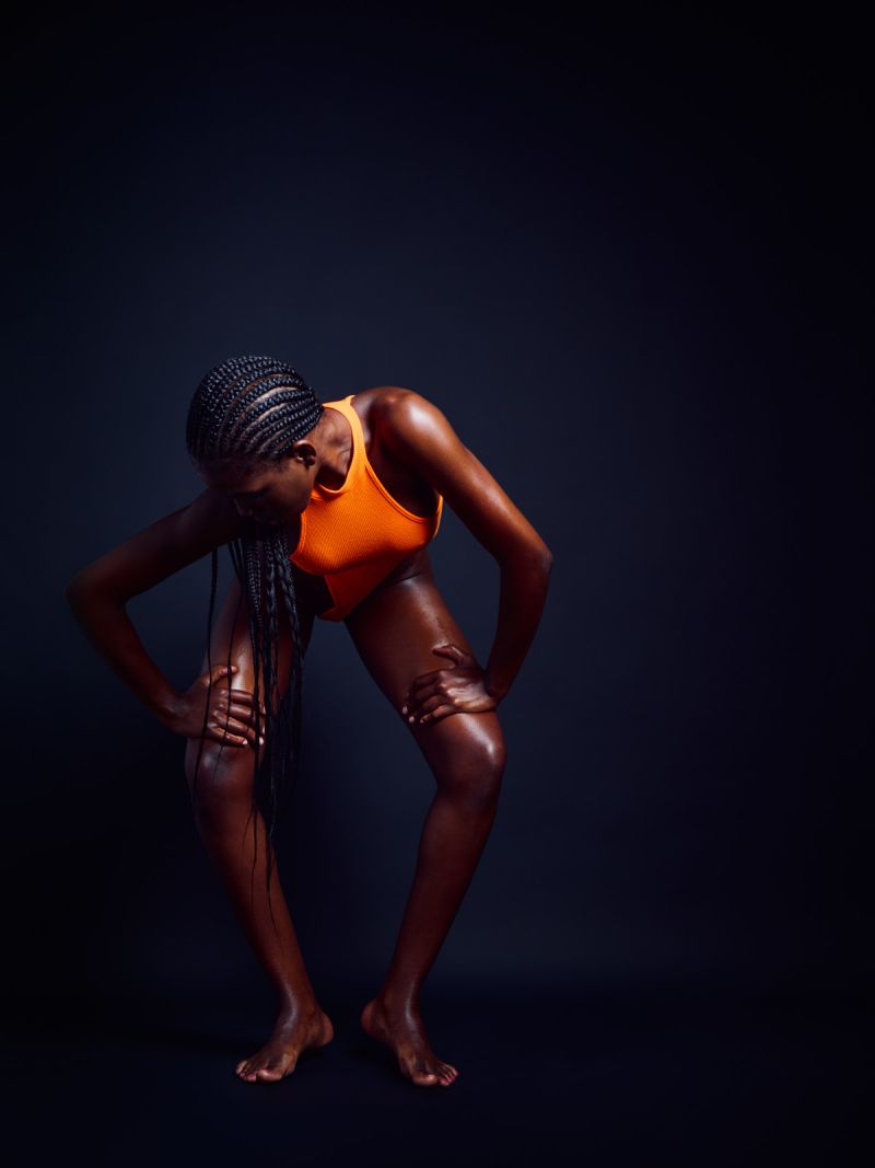 Lucia Bindang in Orange Black by Kenneth Svendlund