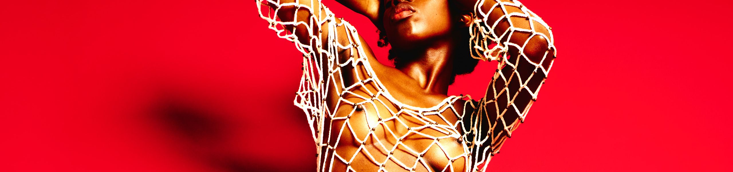 Lucia Bindang in Red by Kenneth Svendlund