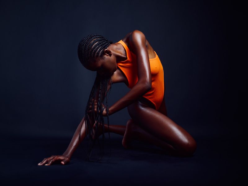 Lucia Bindang in Orange Black by Kenneth Svendlund